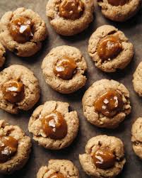 Deliciously Irresistible: Peanut Butter Thumbprint Cookies with a Sweet Surprise!